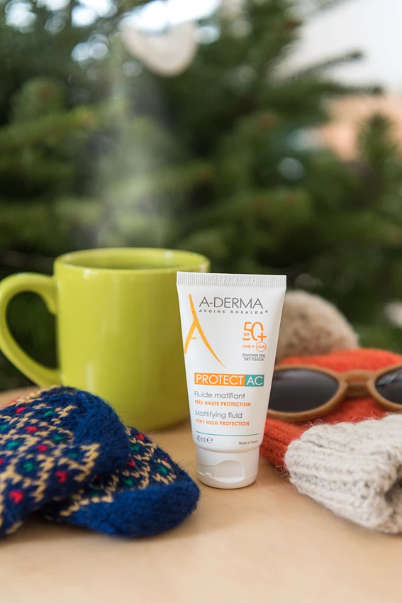 A-Derma Protect AC matirajoči fluid za zaščito pred soncem ZF50+, 40 ml